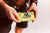 Man holding a Turbopup in Peanut Butter Flavor - Dog Power Bar | Zee.Dog