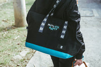 Mutts Kick Butts Dog Patches applyed on dog carrier | Zee.Dog
